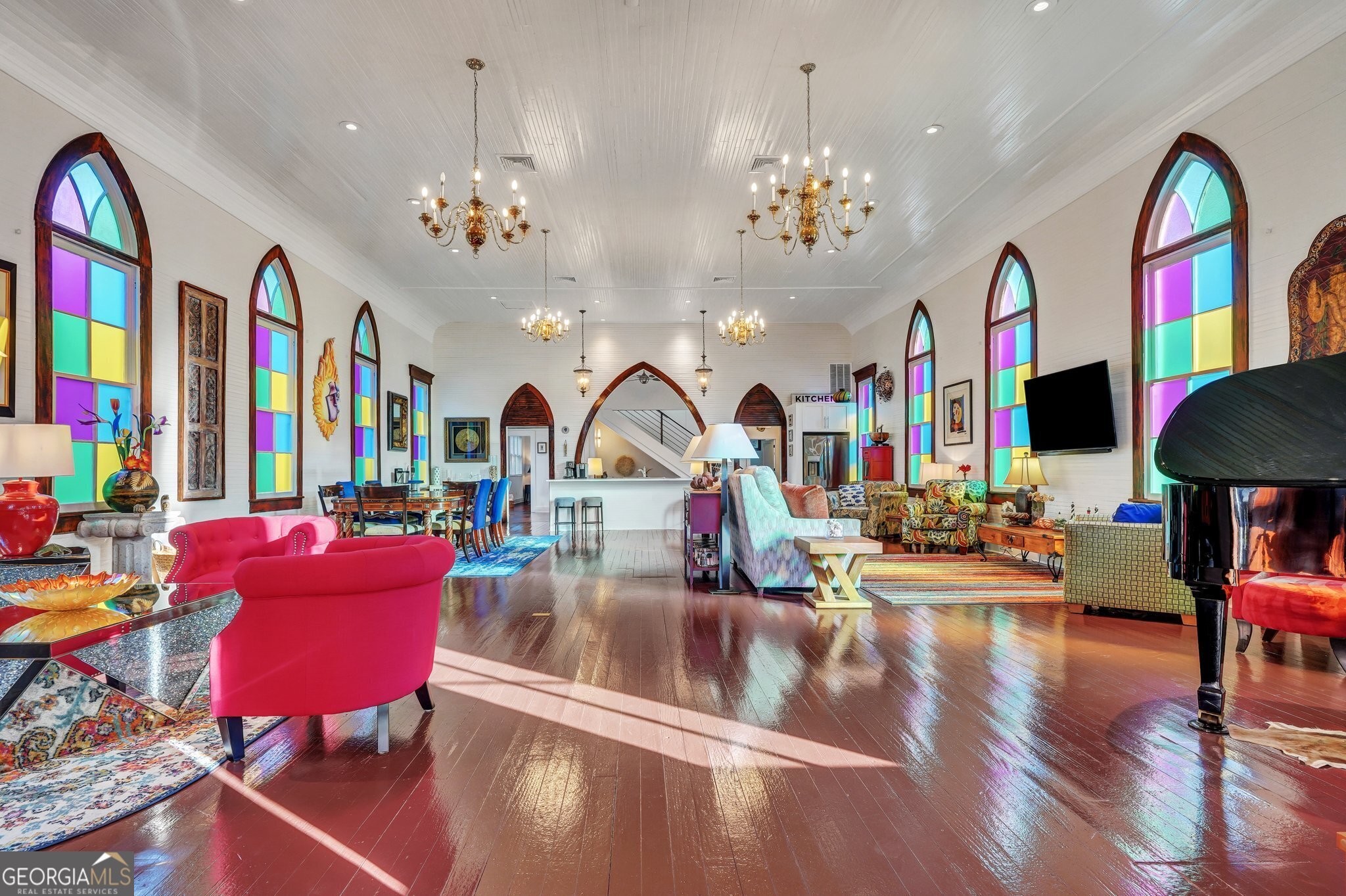 2716 Mechanics Avenue Thunderbolt, GA 31404 - Photo 7 of 50 a living room with patio furniture and a chandelier