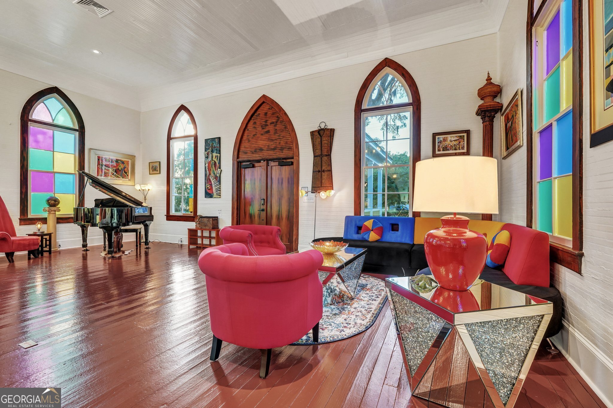 2716 Mechanics Avenue Thunderbolt, GA 31404 - Photo 9 of 50 a living room with furniture kitchen view and a large window