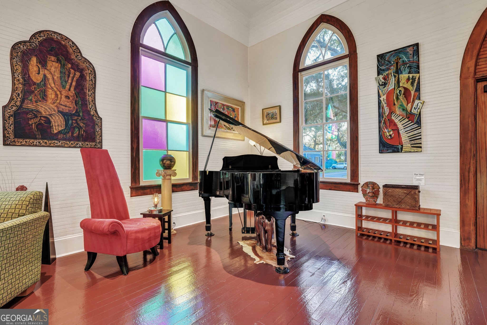 2716 Mechanics Avenue Thunderbolt, GA 31404 - Photo 10 of 50 a living room with furniture a rug and wooden floor