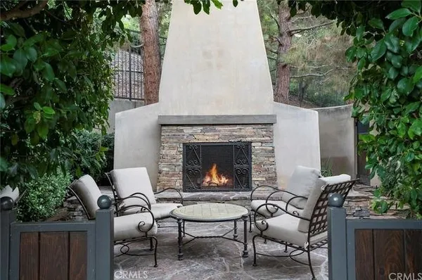 swimming pool with outdoor seating and yard
