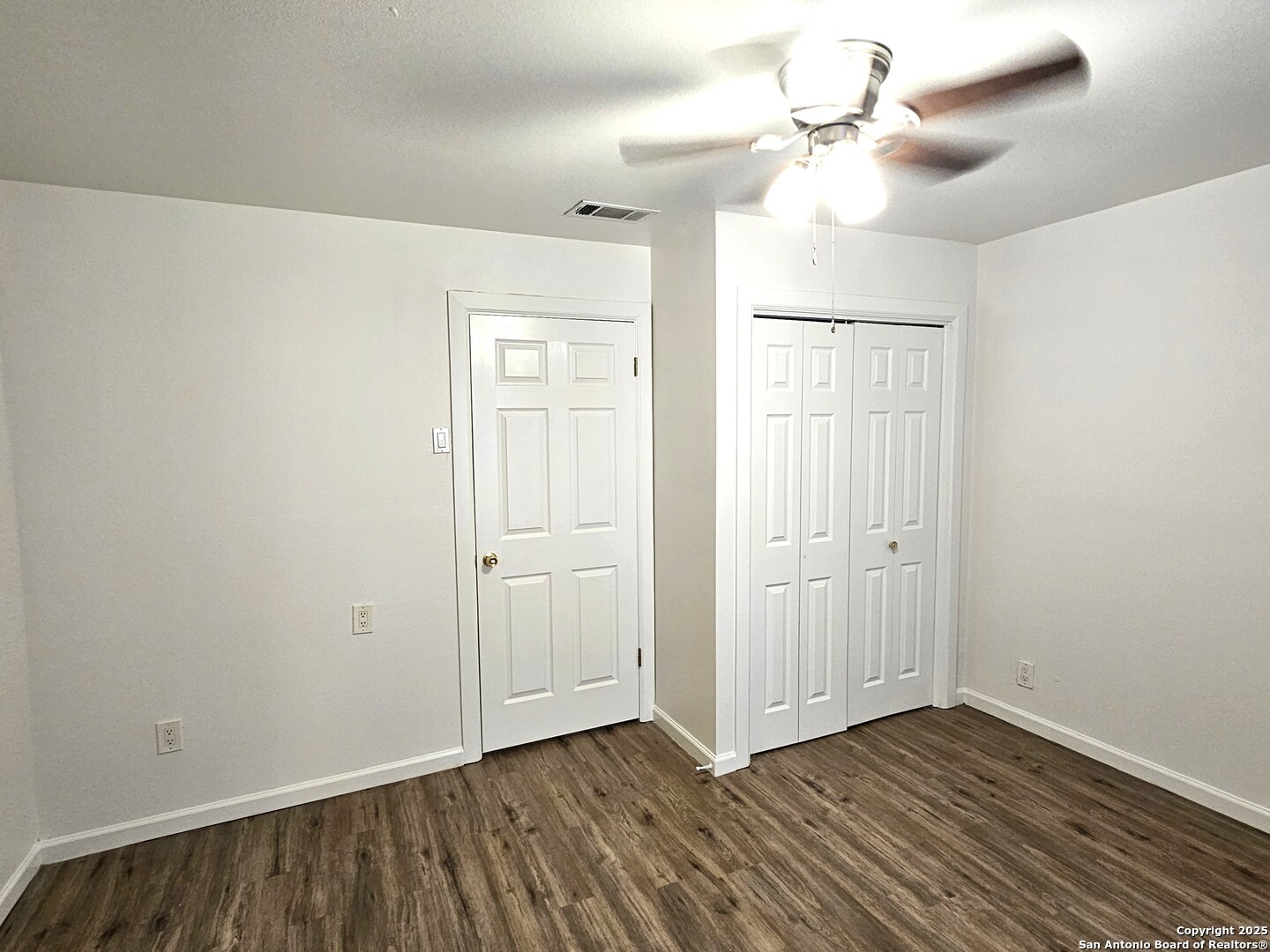 105 Santa Clara Street Cibolo, TX 78108 - Photo 12 of 35 a view of an empty room with window and a chandelier fan