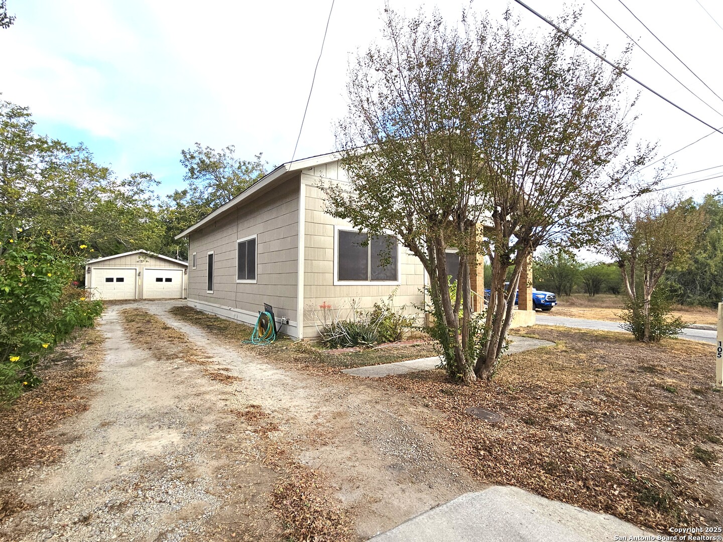 105 Santa Clara Street Cibolo, TX 78108 - Photo 34 of 35 a house view with a backyard space
