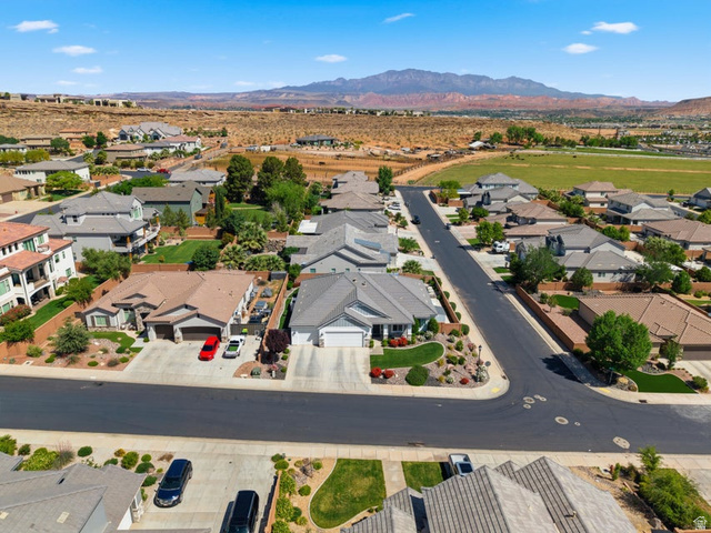 2829 East 1880th Street South St. George, UT 84790 - Photo 4 of 54 Aerial perspective of suburban area with mountains