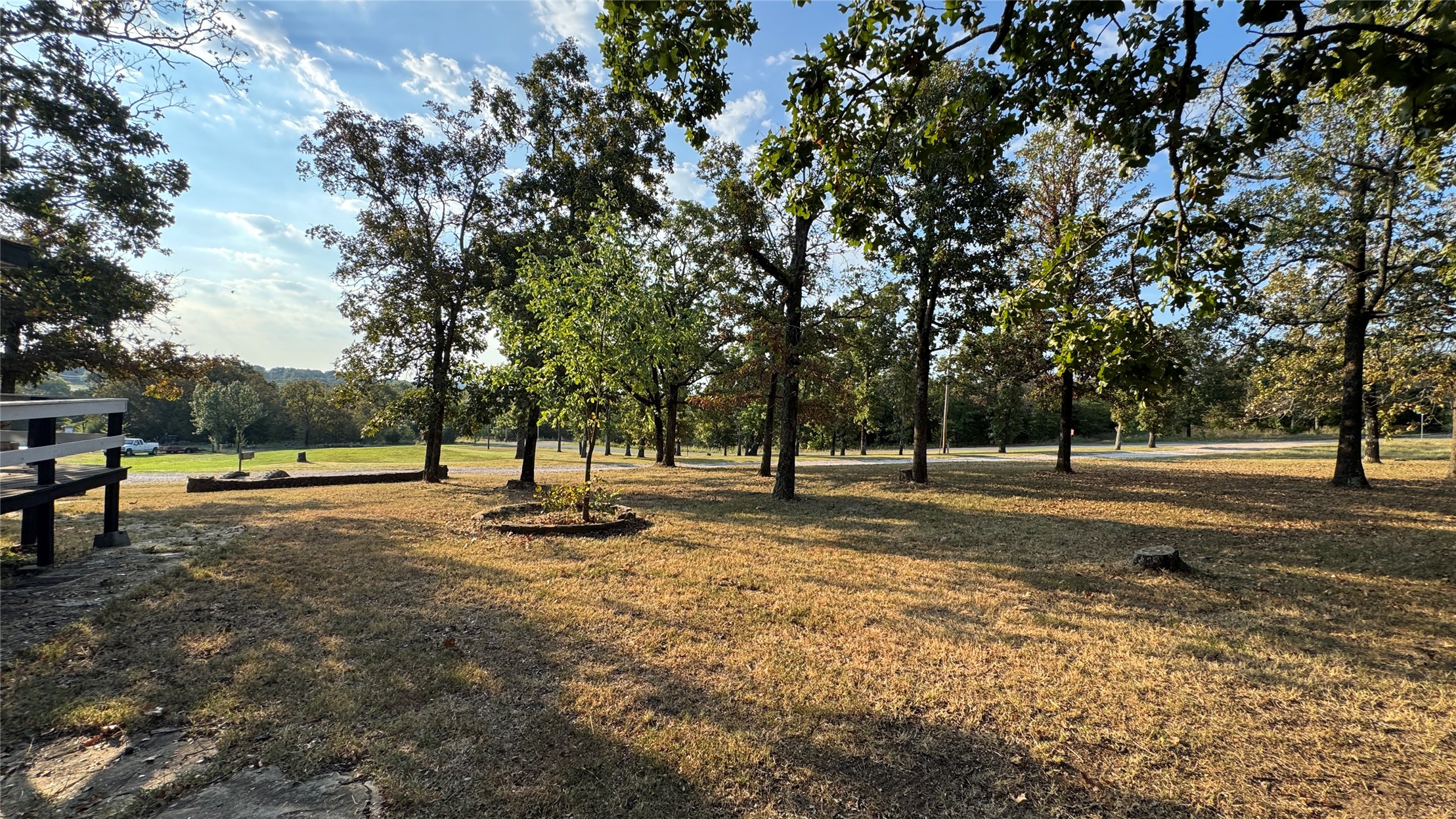 96358 South 4531 Road Vian, OK 74962 - Photo 57 of 58 Expansive outdoor space featuring mature trees and a manicured lawn