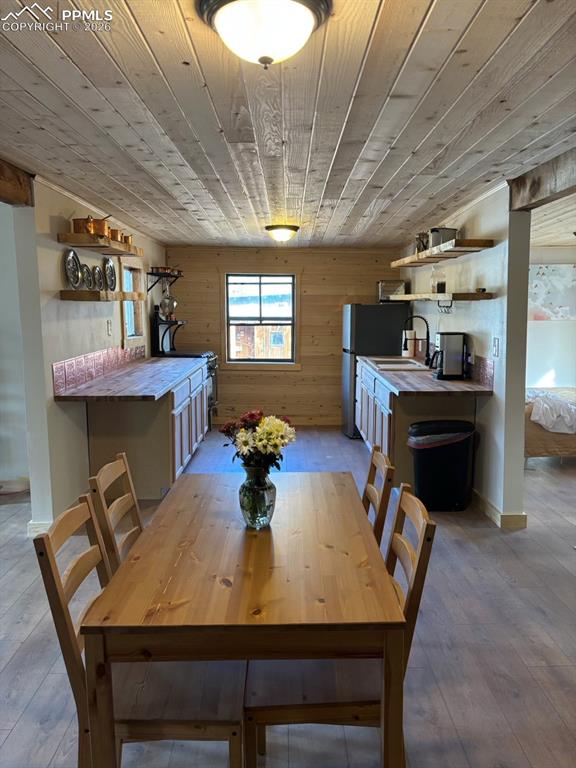 3800 Doe Valley Road Guffey, CO 80820 - Photo 11 of 43 a view of a dining room with furniture