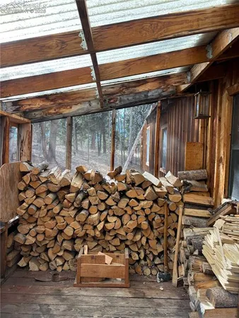 a backyard of a house with a tree
