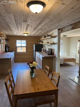 a view of a dining room with furniture