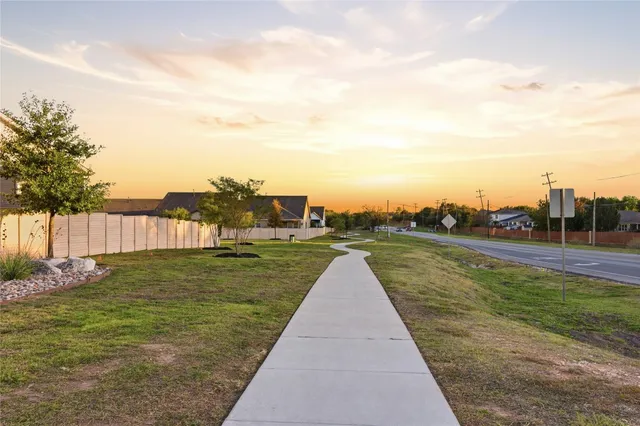 a view of a lake with a yard
