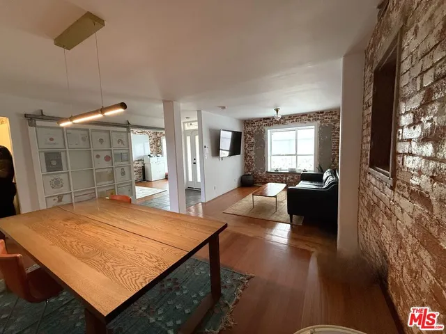 a living room with a couch and a fireplace