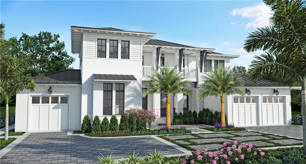 406 Rudder Road Naples, FL 34102 - Photo 2 of 3 a front view of a house with a yard
