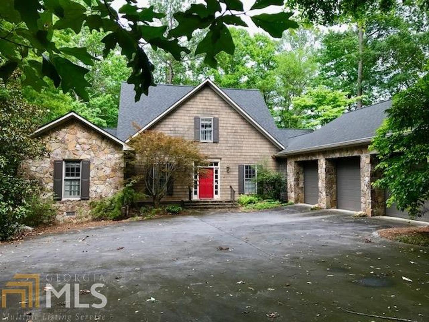 2 Overhill Road Southeast Rome, GA 30161 - Photo 1 of 1 a front view of a house with a yard and garage
