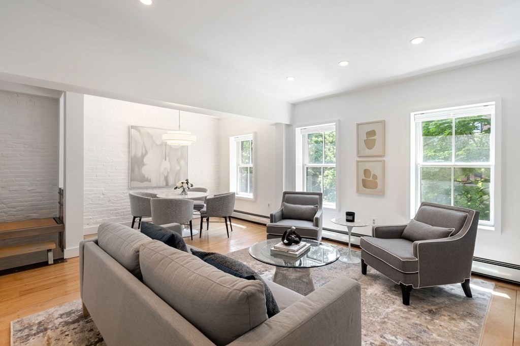 201 West Springfield Street, Unit 3 Boston, MA 02118 - Photo 1 of 21 a living room with furniture and a large window