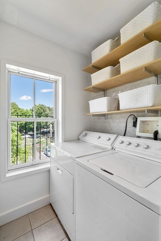 201 West Springfield Street, Unit 3 Boston, MA 02118 - Photo 15 of 21 a utility room with dryer and washer