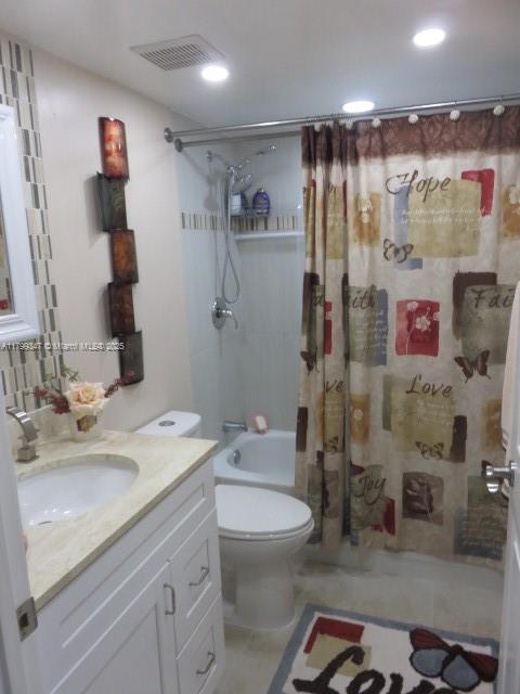 7040 Southwest 24th Street, Unit 104 Miami, FL 33155 - Photo 13 of 27 a bathroom with a sink a toilet and shower