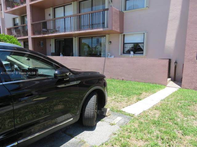 7040 Southwest 24th Street, Unit 104 Miami, FL 33155 - Photo 27 of 27 a view of a backyard with sitting area