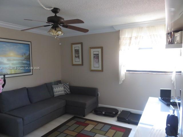 7040 Southwest 24th Street, Unit 104 Miami, FL 33155 - Photo 10 of 27 a living room with furniture and a window