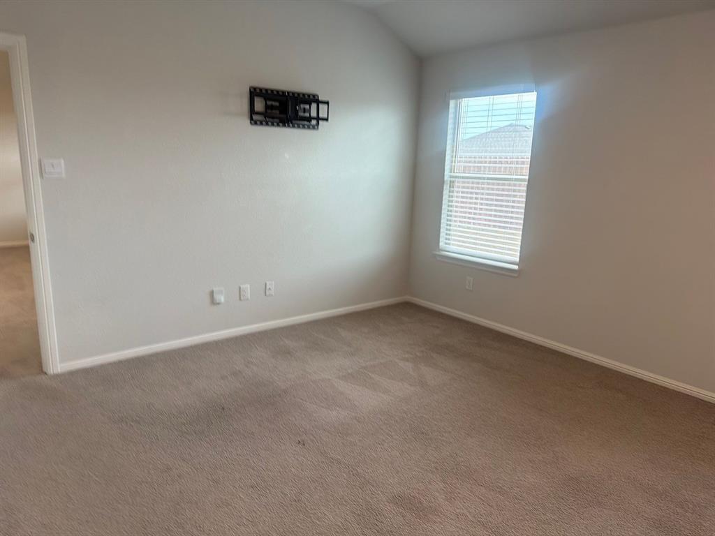 721 Durango Lane Cleburne, TX 76033 - Photo 15 of 25 an empty room with a window