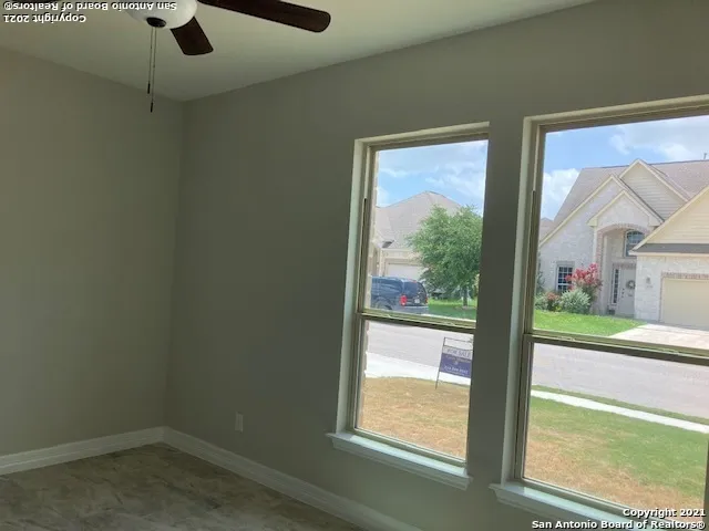 a bathroom with sink and mirror