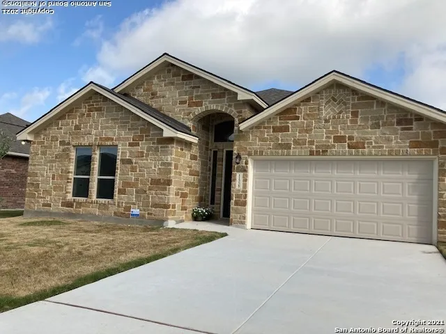 a view of a house with a garage