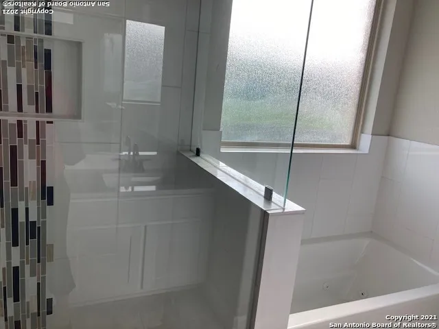 a bathroom with a bathtub