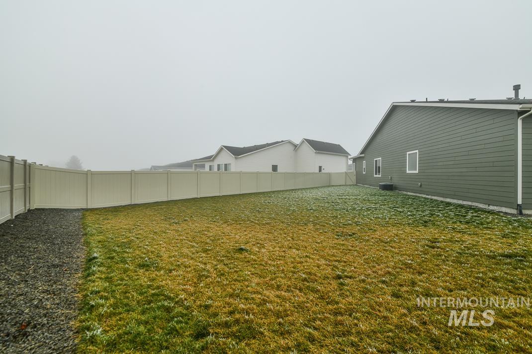 5610 Sparky Avenue Caldwell, ID 83607 - Photo 22 of 27 side View of fenced backyard