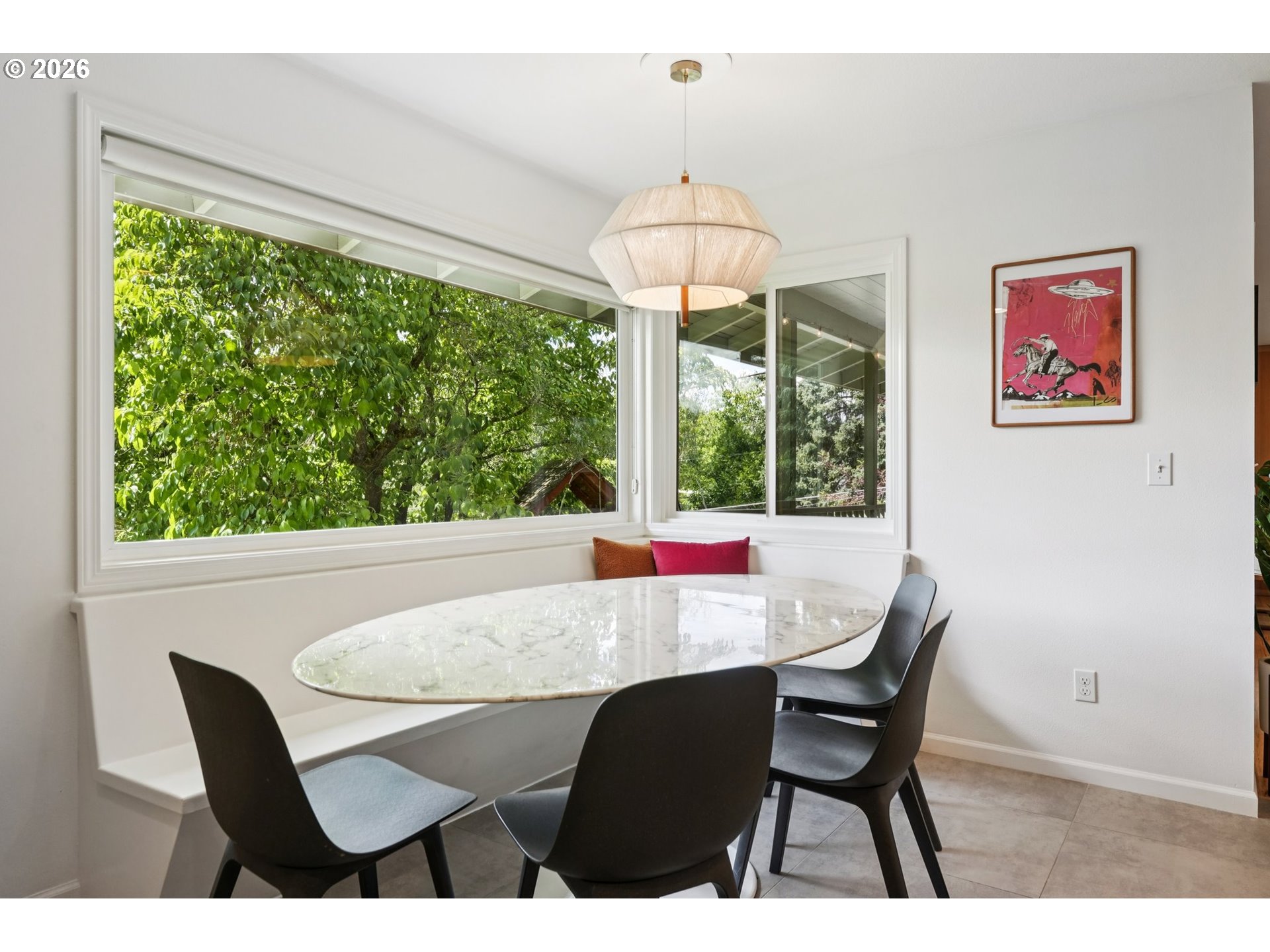 7225 Southwest 13th Avenue Portland, OR 97219 - Photo 14 of 48 a view of a dining room with furniture window and outside view