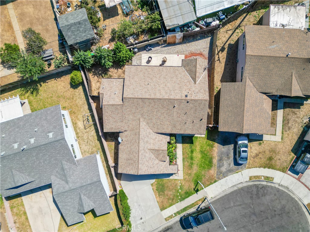 14606 South Caswell Avenue Compton, CA 90220 - Photo 2 of 5 an aerial view of residential houses with outdoor space