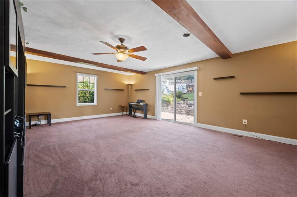 441 Old Farm Road Pittsburgh, PA 15228 - Photo 15 of 33 an empty room with windows and ceiling fan view