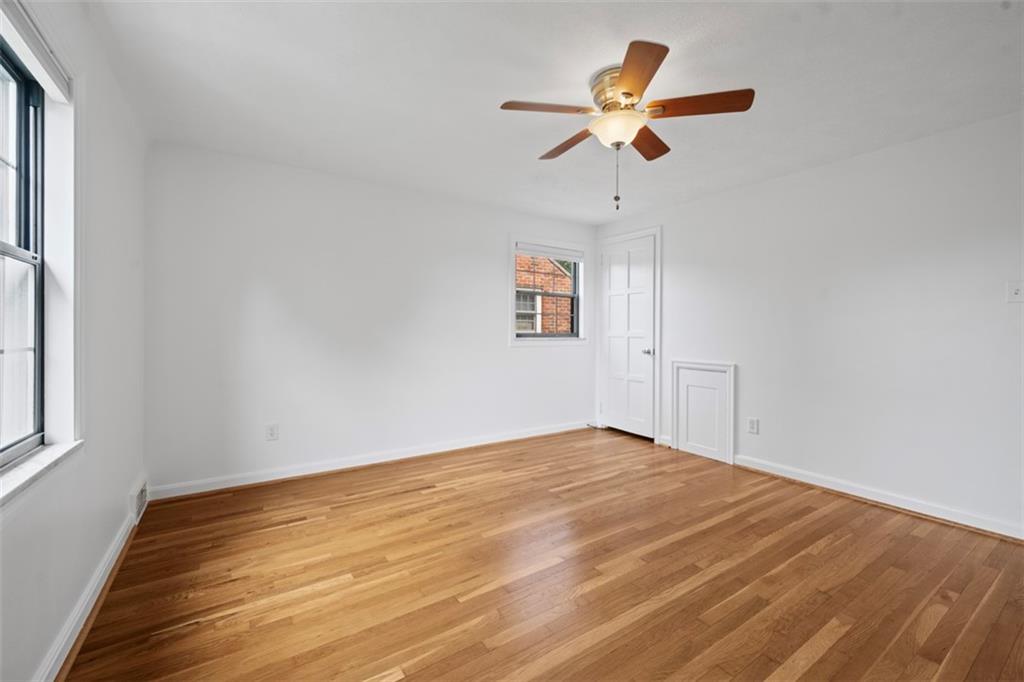 441 Old Farm Road Pittsburgh, PA 15228 - Photo 25 of 33 wooden floor in an empty room with a window