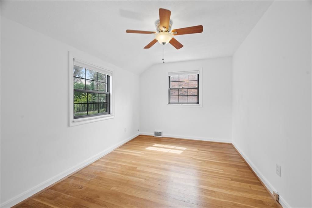 441 Old Farm Road Pittsburgh, PA 15228 - Photo 26 of 33 an empty room with windows and fan