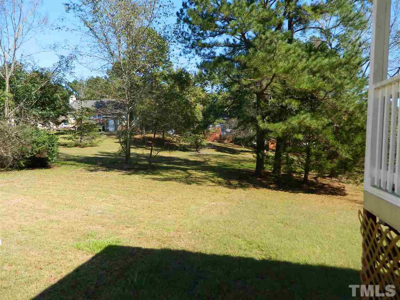 3624 Castlegate Drive Raleigh, NC 27616 - Photo 14 of 15 a view of a yard with an outdoor space