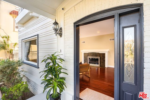 a view of fireplace and wooden floor