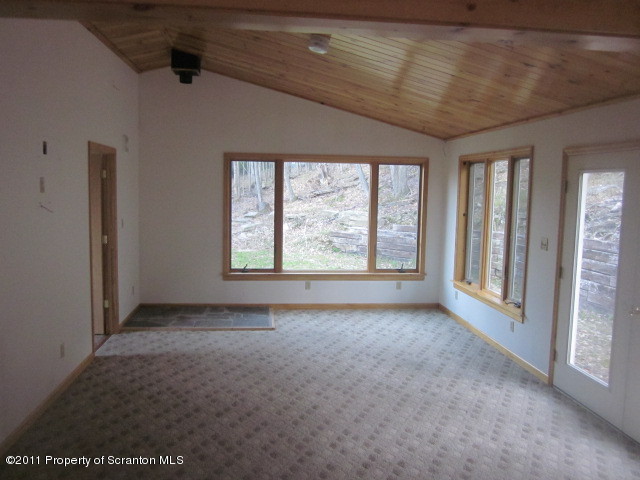 2179 Hunsinger Road Hallstead, PA 18822 - Photo 3 of 10 an empty room with windows
