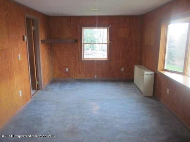 2179 Hunsinger Road Hallstead, PA 18822 - Photo 6 of 10 an empty room with windows