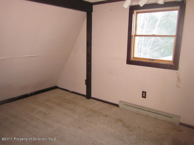 2179 Hunsinger Road Hallstead, PA 18822 - Photo 9 of 10 an empty room with a window