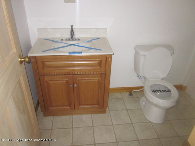 2179 Hunsinger Road Hallstead, PA 18822 - Photo 10 of 10 a bathroom with a toilet and a sink