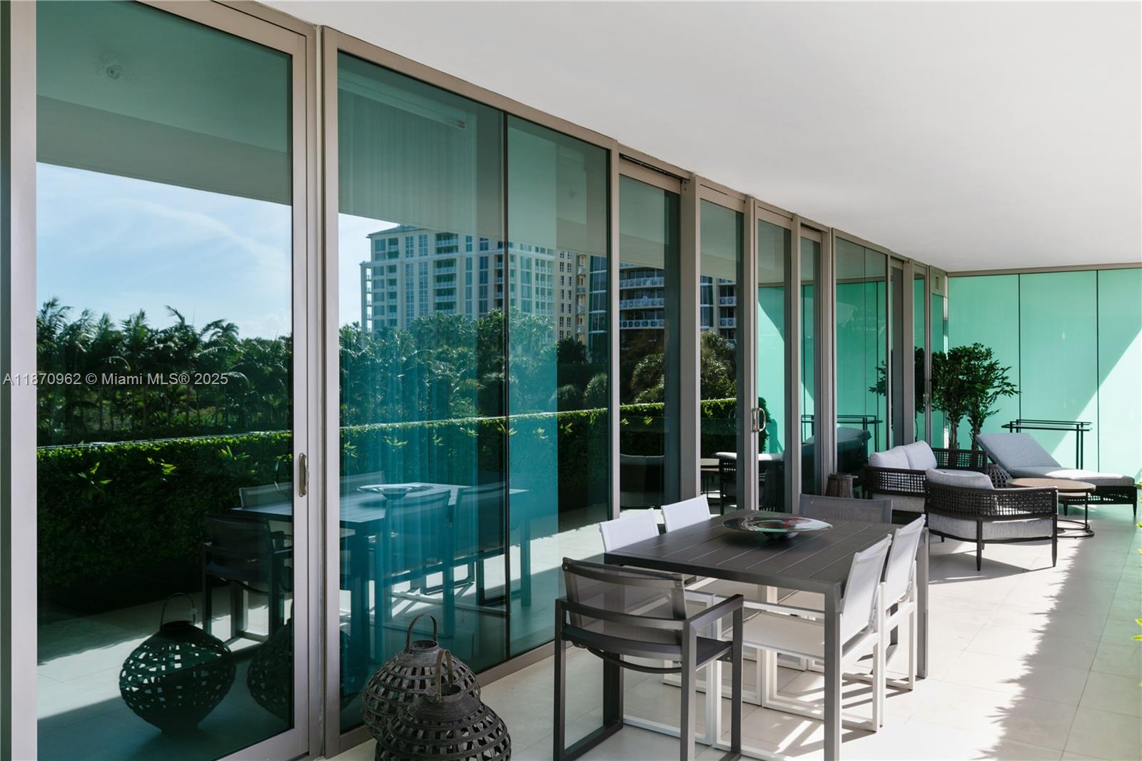 360 Ocean Drive, Unit 305S Key Biscayne, FL 33149 - Photo 4 of 27 a view of an outdoor seating area