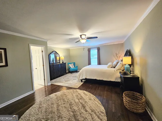 a bathroom with a double vanity sink toilet and shower