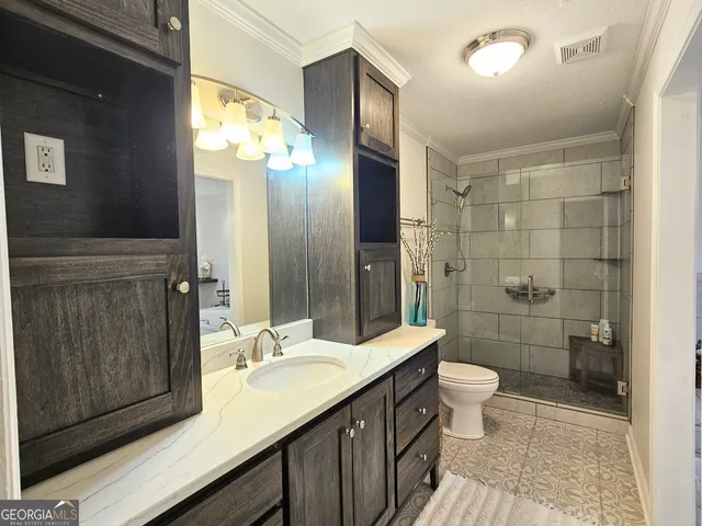 a bathroom with a tub and a chair