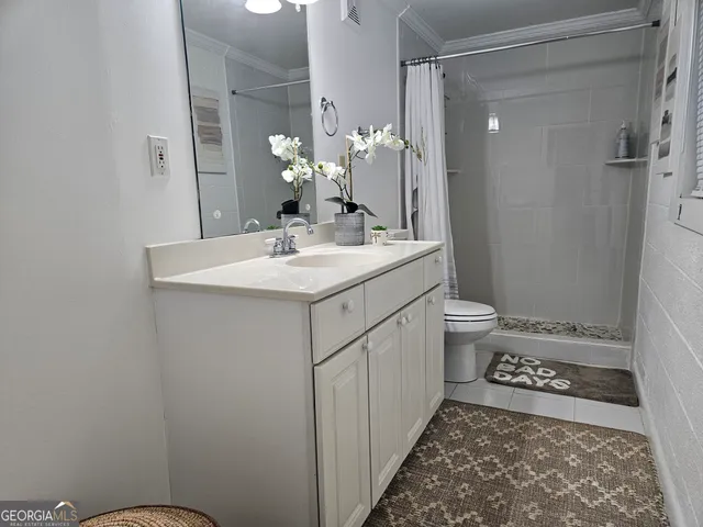 a view of balcony with wooden floor and fence