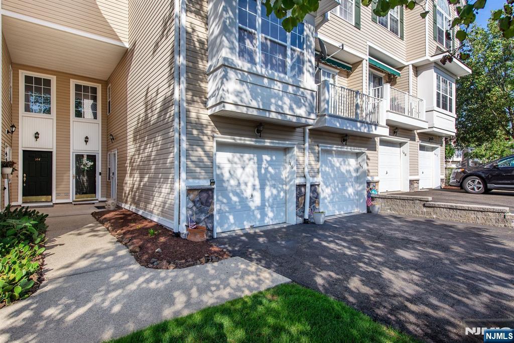 146 Summit Ridge, Unit 1406 Pompton Lakes, NJ 07442 - Photo 22 of 26 a view of a street with building in the background