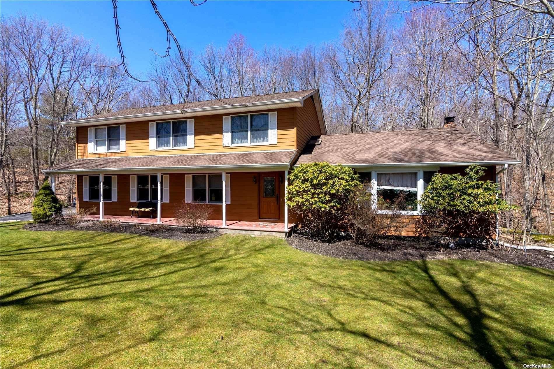 1 Old Mill Path St. James, NY 11780 - Photo 1 of 1 a view of a house with pool and sitting area