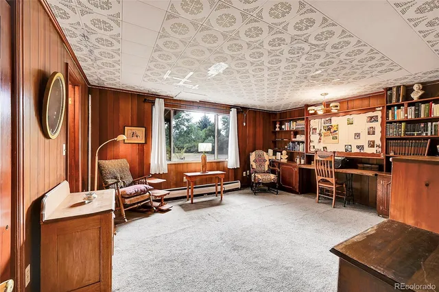a view of a livingroom with furniture and windows