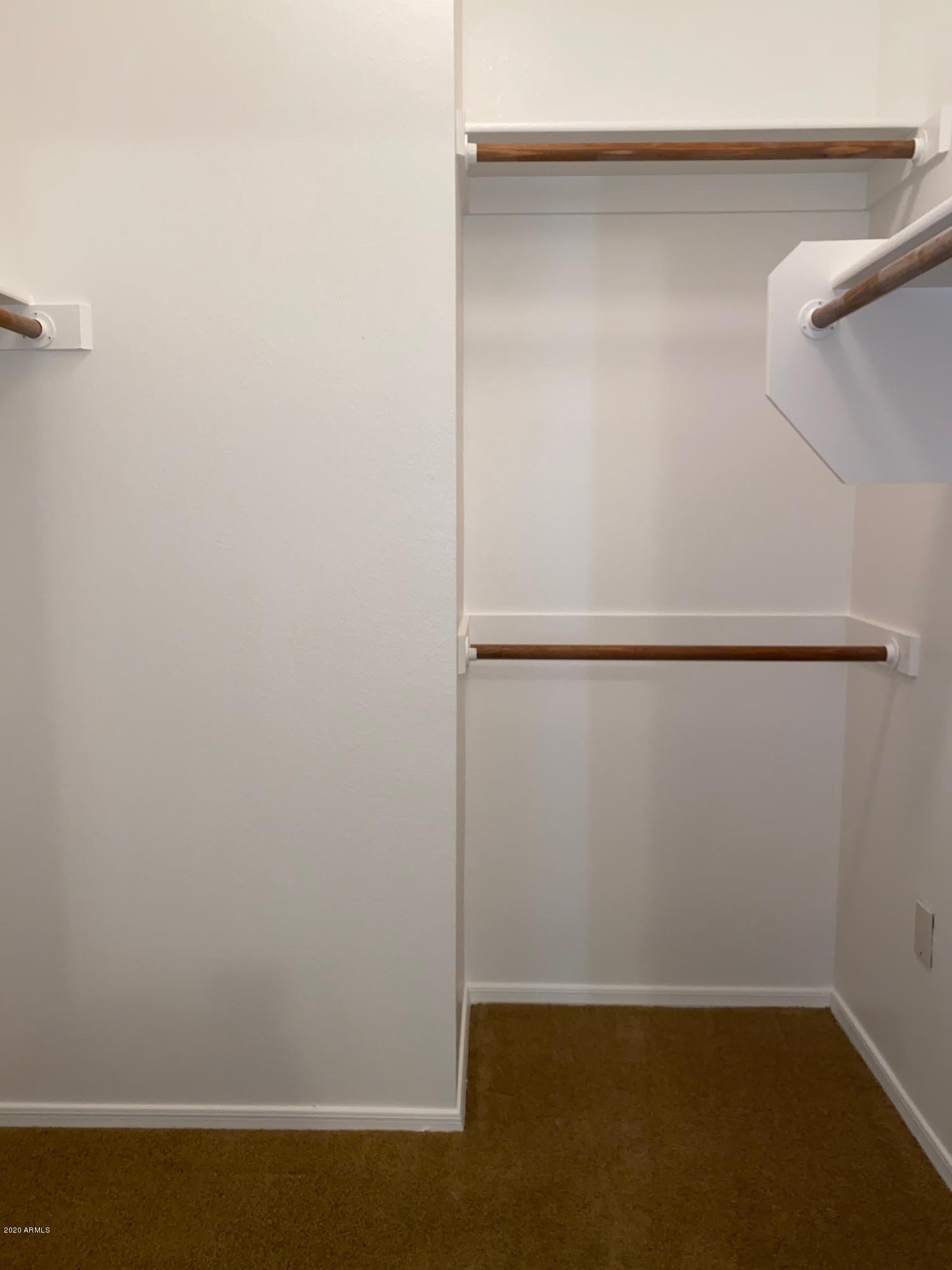 1701 East Colter Street, Unit 263 Phoenix, AZ 85016 - Photo 11 of 18 a view of small space with racks on the wall