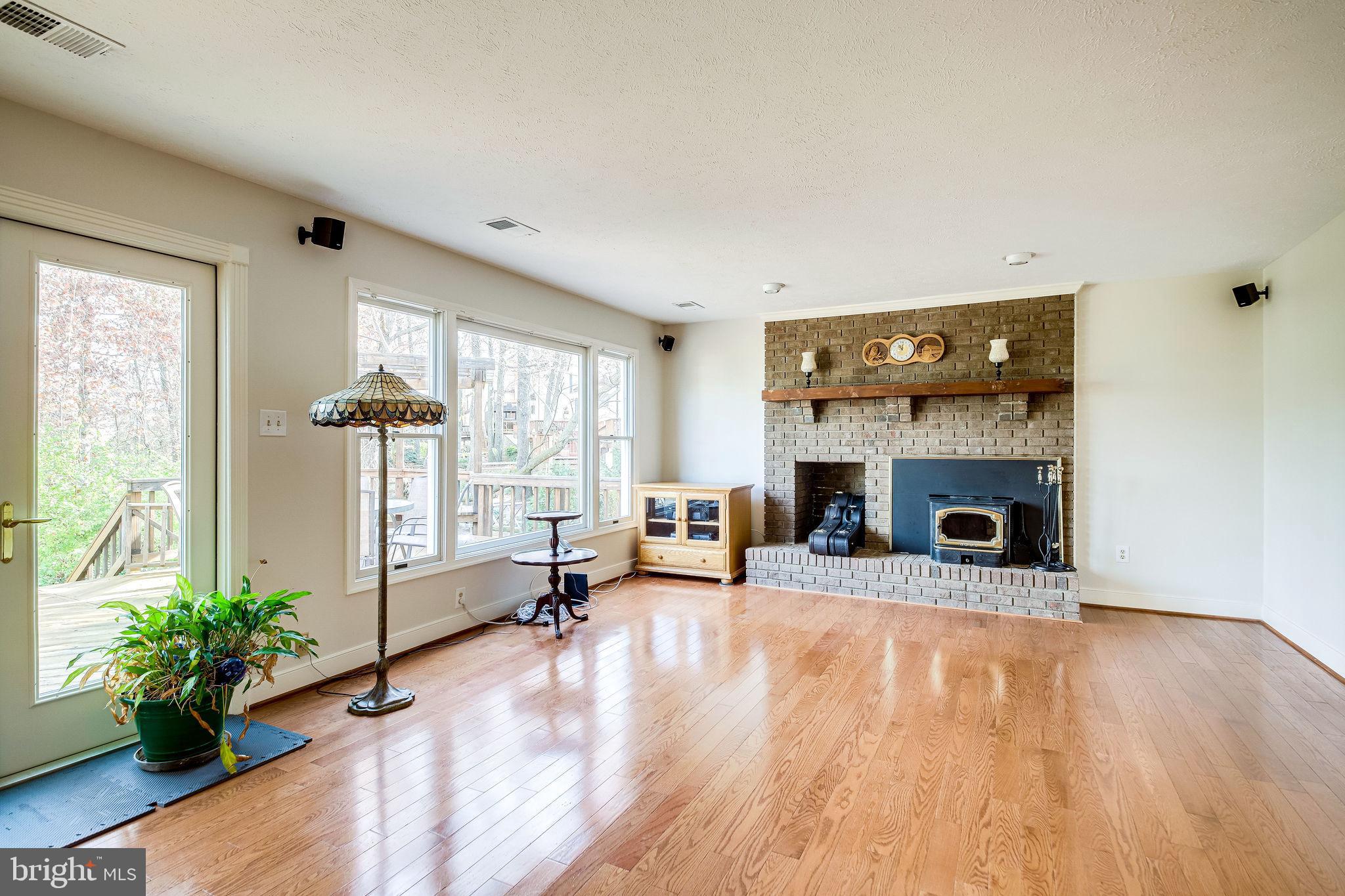58 Rutherford Circle Sterling, VA 20165 - Photo 16 of 51 Hardwood floors and wood stove in family rm