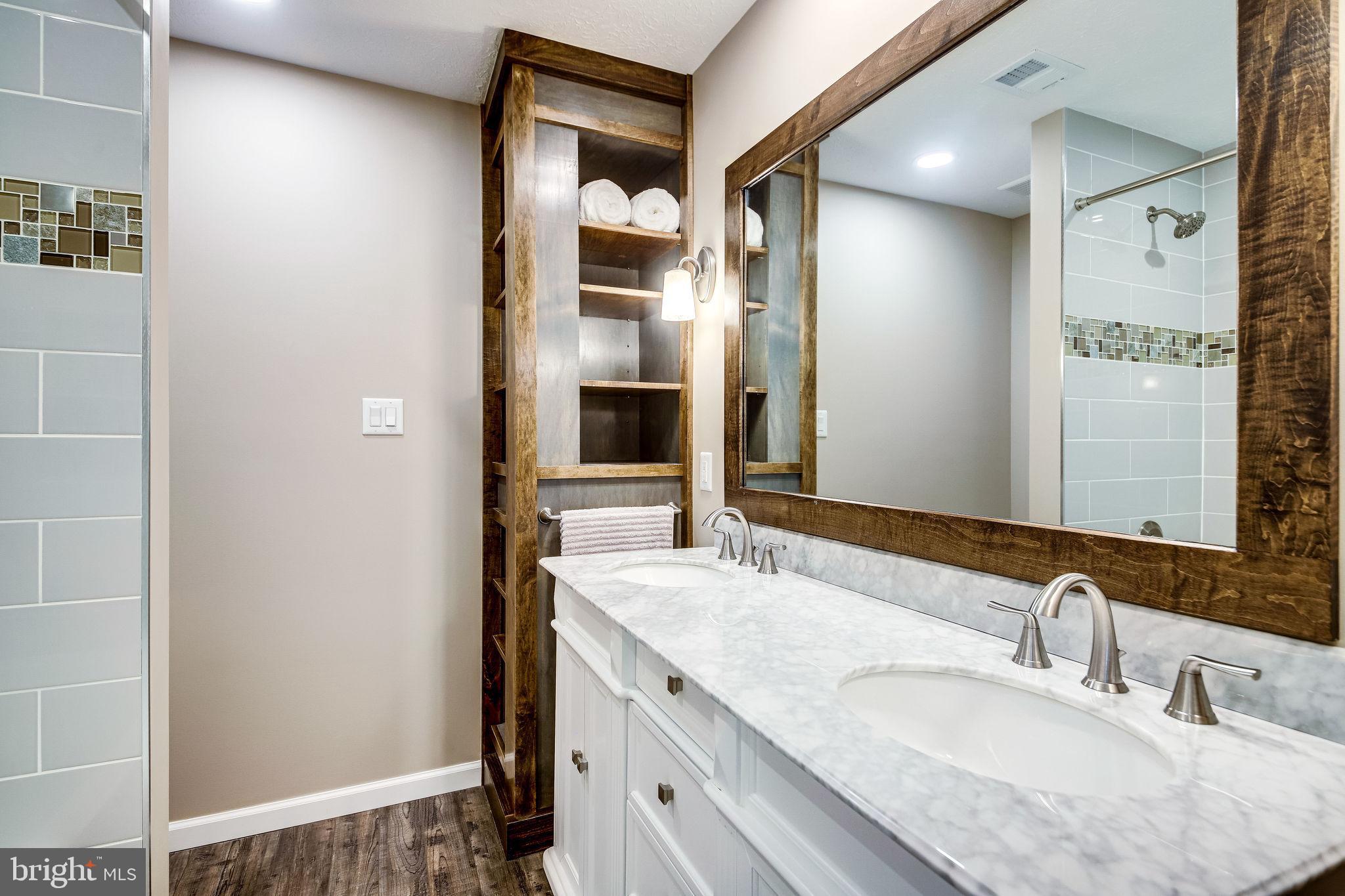 58 Rutherford Circle Sterling, VA 20165 - Photo 33 of 51 Updated hall full bath with storage
