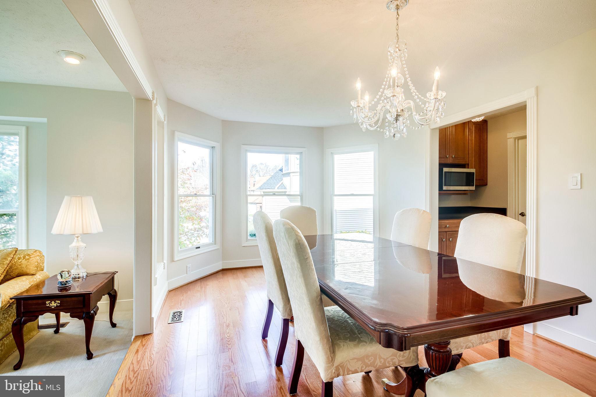 58 Rutherford Circle Sterling, VA 20165 - Photo 8 of 51 Hardwood floors in the dining room
