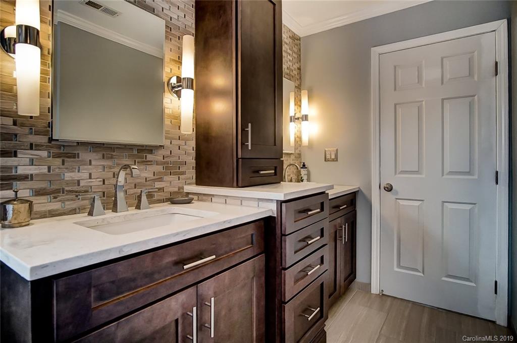 2353 Harvester Avenue Fort Mill, SC 29708 - Photo 14 of 25 a bathroom with a sink and a mirror
