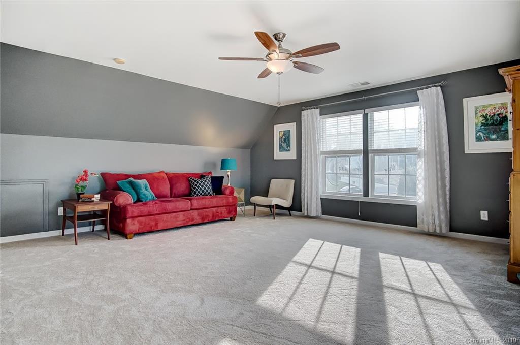 2353 Harvester Avenue Fort Mill, SC 29708 - Photo 22 of 25 a living room with furniture and a large window