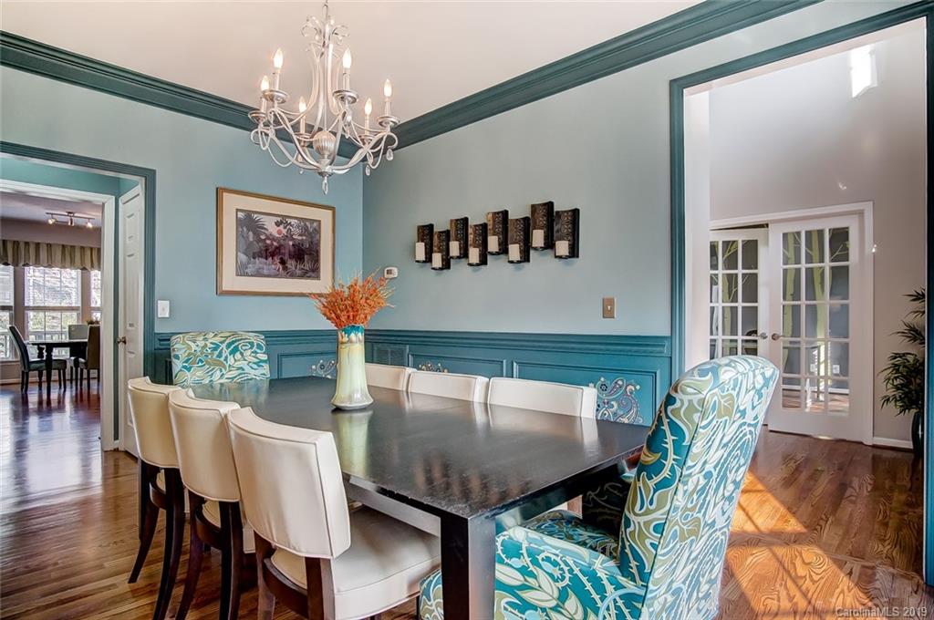 2353 Harvester Avenue Fort Mill, SC 29708 - Photo 8 of 25 a view of a dining room with furniture and chandelier